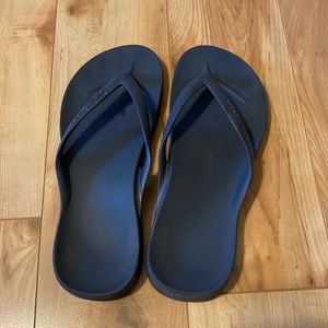 Archie’s flip flops